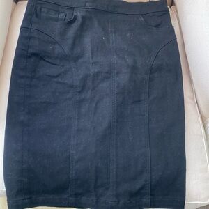 2 for the $ of one! Black denim pencil skirt. Kick pleat. Back zipper detail.